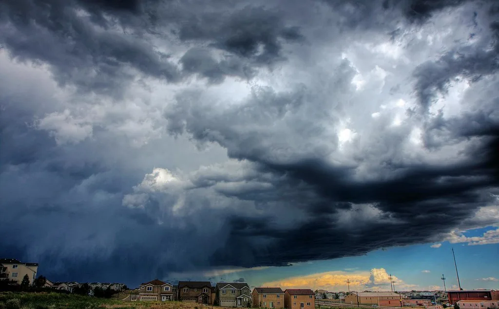 Dark storm clouds over a town