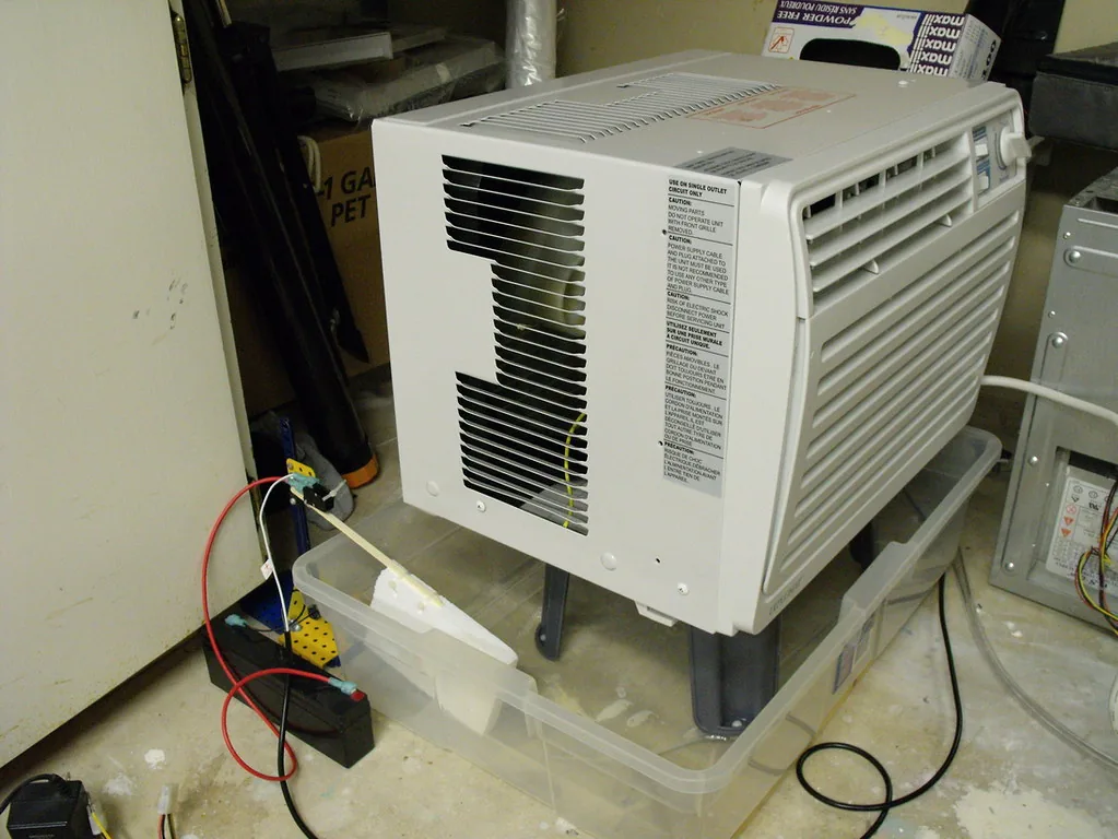 Portable dehumidifier unit with drainage hose