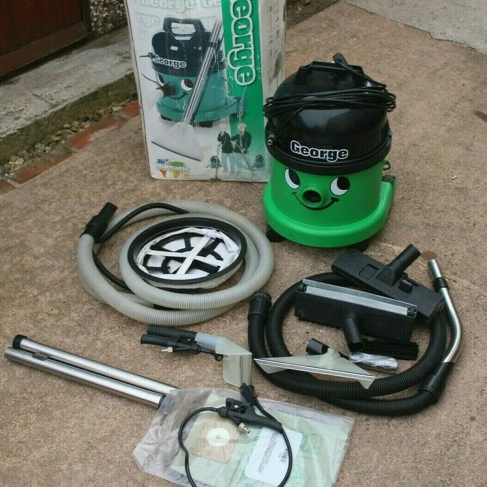 Wet/dry vacuum with hoses and attachments